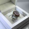 Red agate ring with the inscription "Allahumma Aghni Bahalak" (O Allah, the Most Generous, the Most Merciful) and...