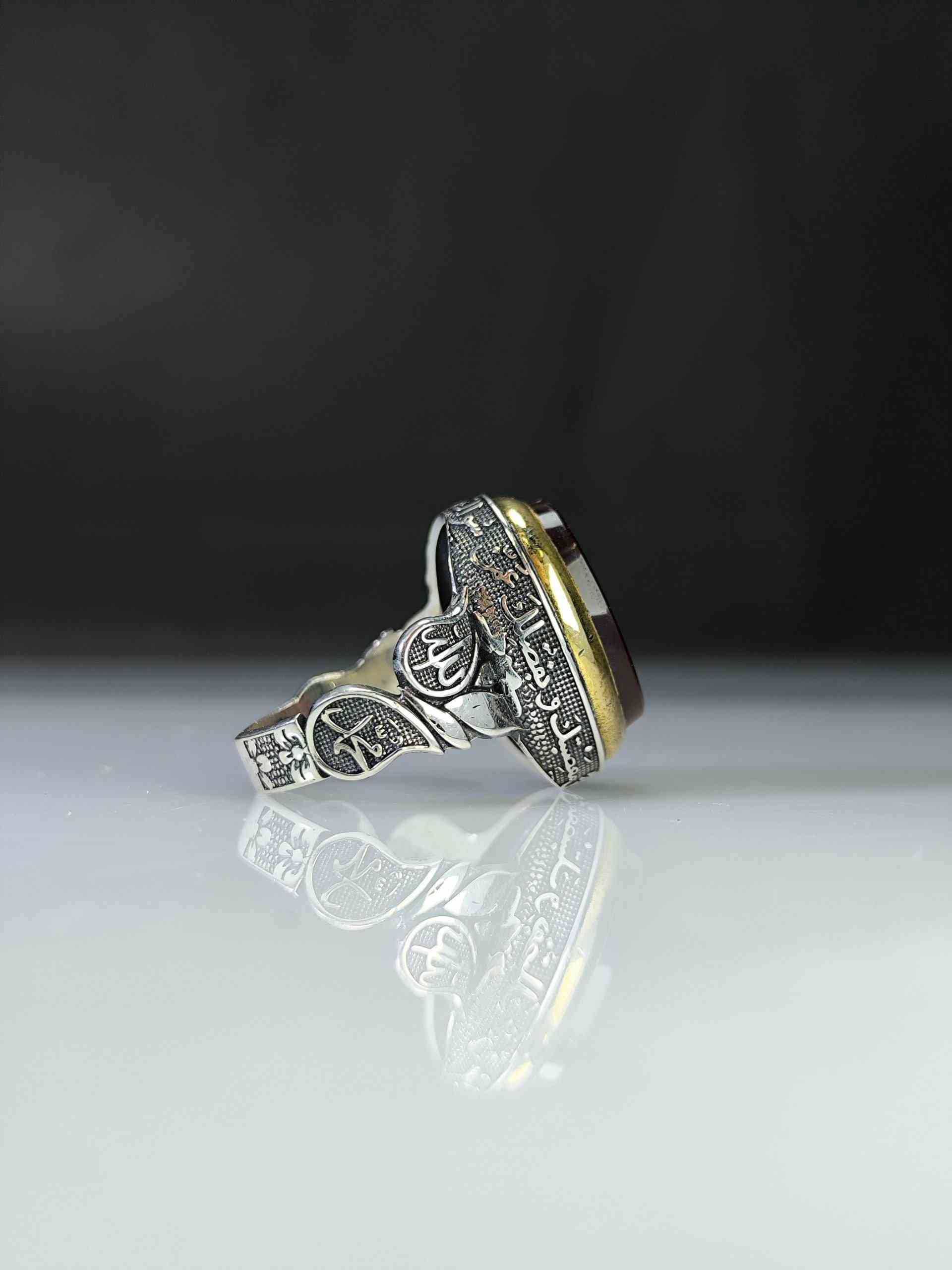 Red agate ring with the inscription "Allahumma Aghni Bahalak" (O Allah, the Most Generous, the Most Merciful) and...
