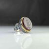 Red agate ring with the inscription "Allahumma Aghni Bahalak" (O Allah, the Most Generous, the Most Merciful) and...